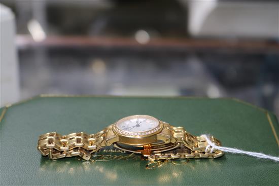 A ladys 18ct gold and diamond set Breguet wrist watch,